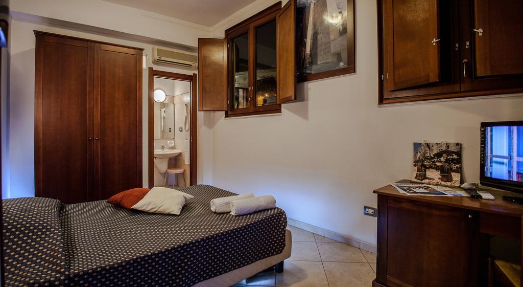 Hotel La Terrazza Cagliari Pokoj fotografie