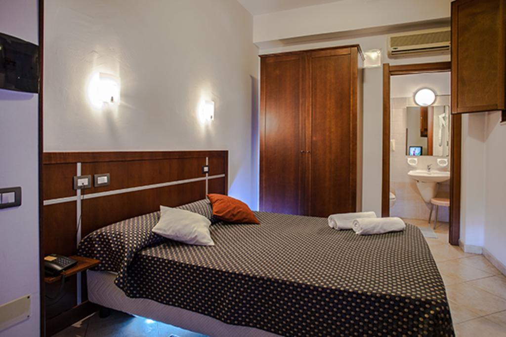 Hotel La Terrazza Cagliari Pokoj fotografie