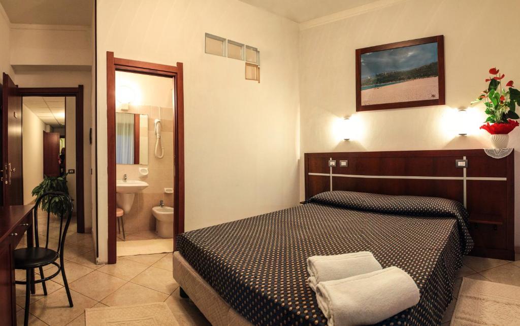 Hotel La Terrazza Cagliari Pokoj fotografie