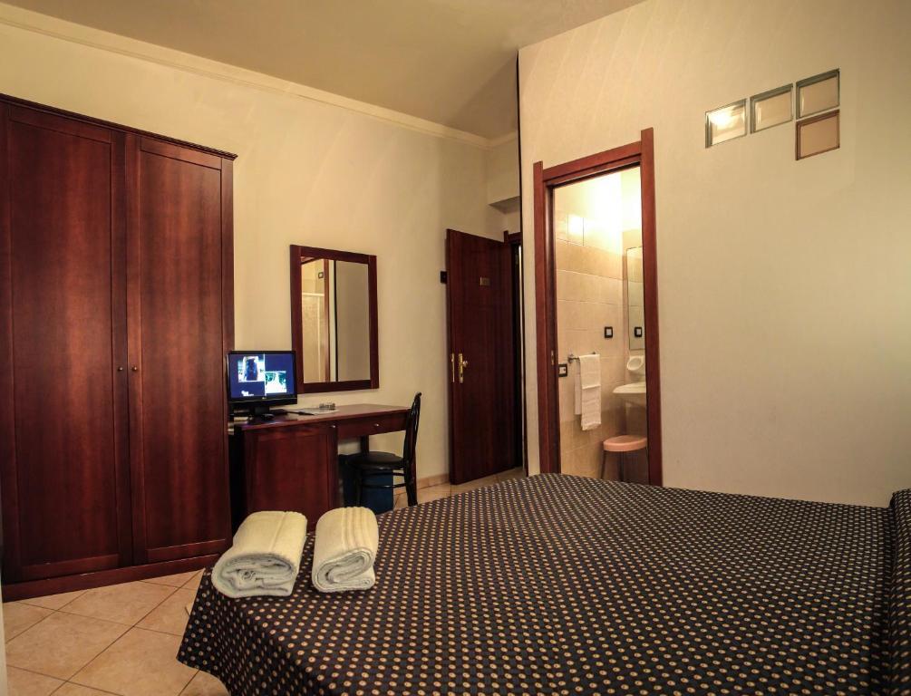 Hotel La Terrazza Cagliari Pokoj fotografie