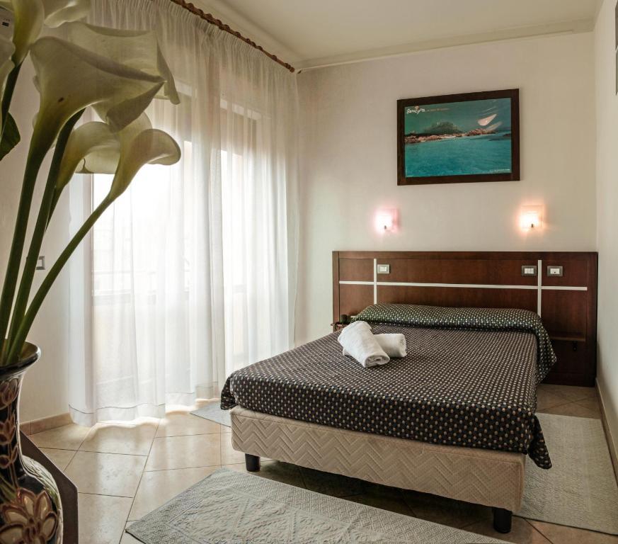 Hotel La Terrazza Cagliari Pokoj fotografie