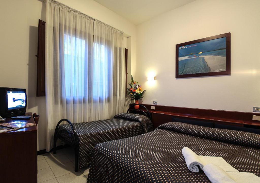 Hotel La Terrazza Cagliari Pokoj fotografie